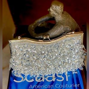 Beautiful beaded clutch so unique for a gala or any special event .